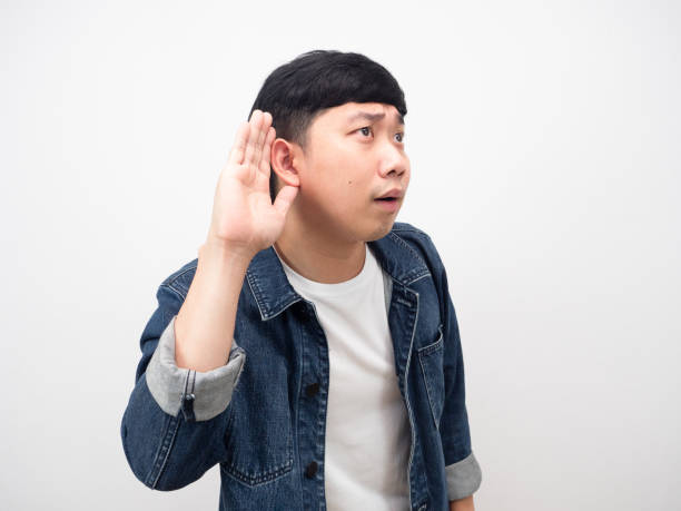 istock Man confused gesture I can't hear isolated 1426903828