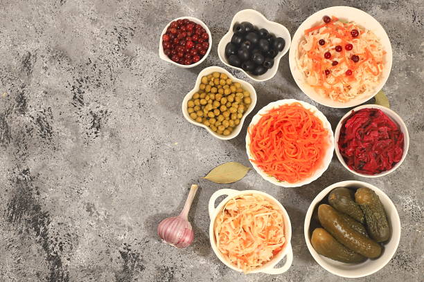 istock Food background, pickled beets, cucumbers, peas, olives, 1426914031