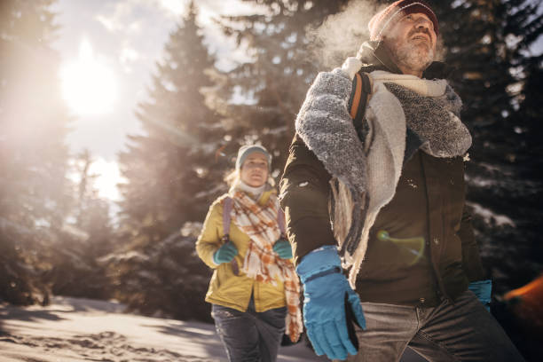 istock Hiking through snow on mountain 1426918600