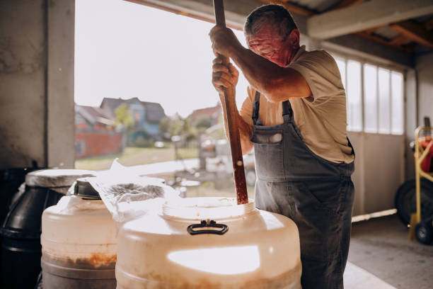 istock Mixing the fruit mash for moonshine 1426918697