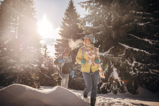 istock Hiking through snow on mountain 1426919110
