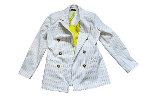 Women’s wear, a fashionable striped white jacket and yellow blouse isolated on the white background with clipping path
