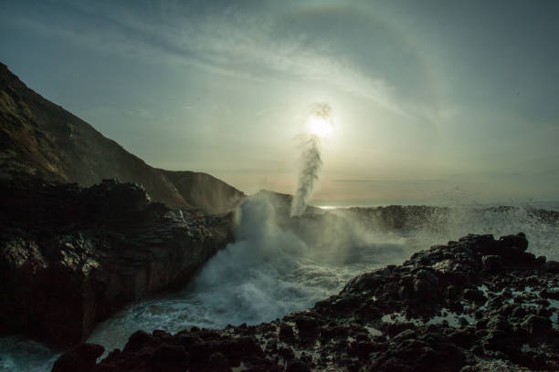 Water shooting out of Spouting Horn, Oregon Coast stock photo