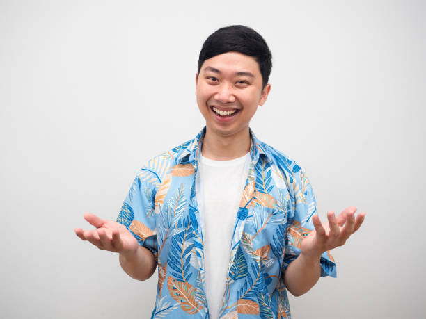 istock Asian man blue shirt happy emotion gesture laugh 1426925595