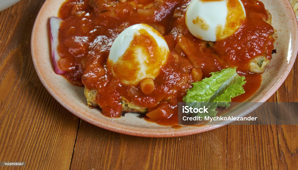 Caucasian Ossetian Meatballs in Tomato Sauce Ossetian, Meatballs,Tomato,  Sauce, Caucasian  cuisine, Traditional assorted dishes, Top view. Beef Stock Photo