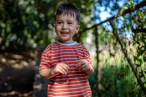 Portrait of  smiling Toddler in nature