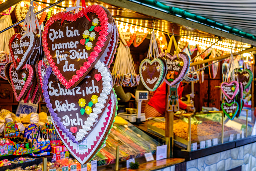 Munich, Germany - September 17:Typical ginger bread heart souvenir at a kiosk on the Oktoberfest (the world's largest folk festival) in Munich on September 17, 2022