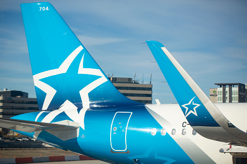 Tail and winglet of Air Transat Airbus A321-271NX aircraft with registration C-GOIJ at Toronto Pearson International Airport in March 2022.