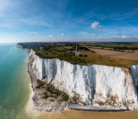drone view of the White Cliffs of Dover and the Dover Patrol Monument statue of the South Foreland