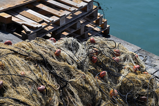 Fishing nets along the quay of the port