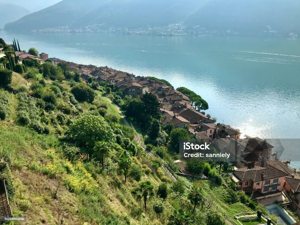 Swiss - canton Ticino - Morcote village Switzerland - canton of Ticino - village of Morcote. Introduction. Located on the shore of Lake Lugano, the former fishing village of Morcote is, without a doubt, one of the most photographed sites in Ticino. Ancient Stock Photo