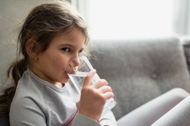 istock Beautiful girl drinking water 1426985177