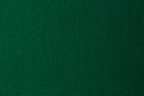 green color felt textile fabric material texture background. abstract monochrome dark blue color felt background - felt textured textured effect textile imagens e fotografias de stock
