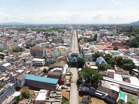 Aerial view from a drone that shows the border town of Mae Sai District, Thailand, And international immigration Tachileik District Of Myanmar
