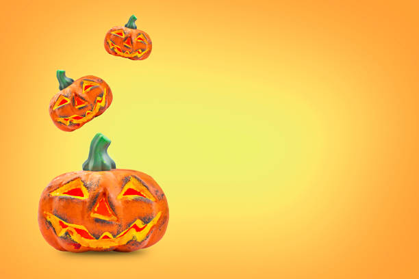 istock Happy halloween, pumpkins on orange background 1426992614