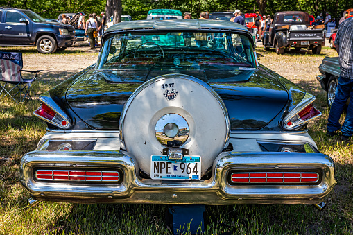 Falcon Heights, MN - June 18, 2022: High perspective rear view of a 1957 Mercury Montclair 4 Door Hardtop Sedan at a local car show.