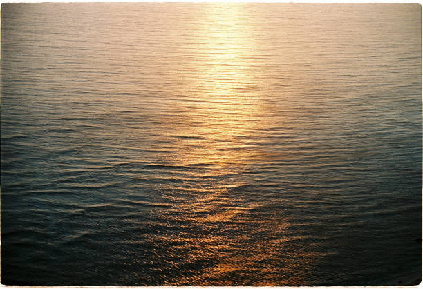 Sunrise with reflecting light on sea surface at Ly Son Island.\n\nLy Son Island, Quang Ngai, Vietnam.\nKodak Ektar 100.
