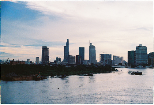 Beautiful scenery of Hochiminh city beside the edge of the water.\n\nHo Chi Minh City, Vietnam.\nKodak Ultramax 400.