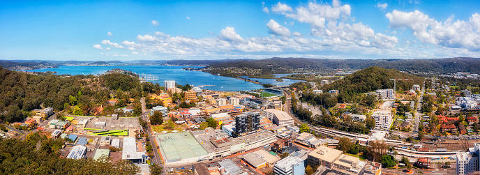 Downtown of Gosford city on Australian Central coast - aerial panorama over waterfront of Brisbane water bay.