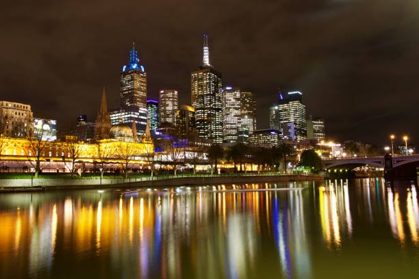 istock Modern skyscrapers reflected in Yarra river at night, Melbourne, Australia 1427016622
