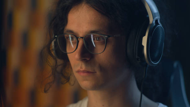 istock Man in headphones working remotely 1427016947