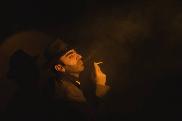 istock portrait of man with smoking hat 1427017916
