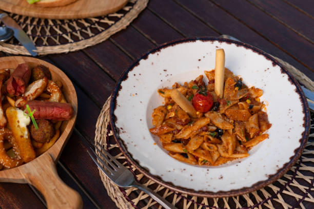 istock Arrabiata penne pasta with snacks 1427028288