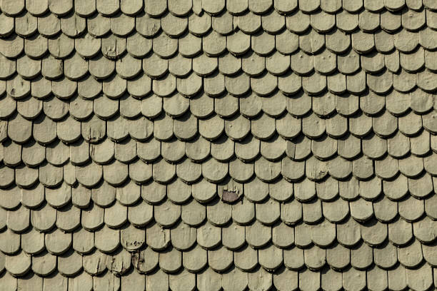 istock pattern of wooden roof shingles 1427036697