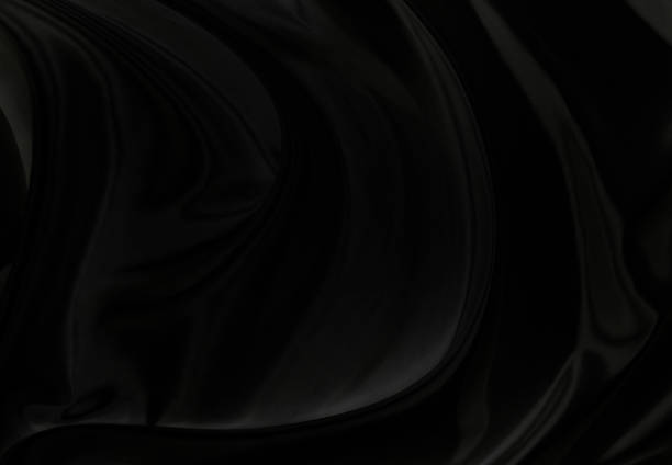istock Black gray satin dark fabric texture luxurious shiny that is abstract silk cloth background with patterns soft waves blur beautiful. 1427050245