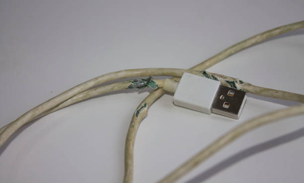 istock The broken and frayed smartphone's cable 1427052002