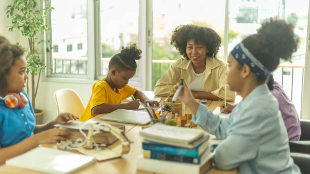 istock Young happy kids enjoy study with friends 1427055285