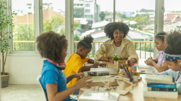 istock Young happy kids enjoy study with friends 1427055286