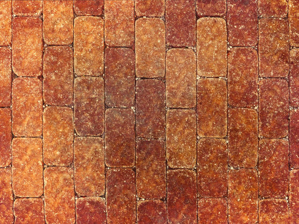 pflaster vintage retro street red brick blocks old cobblestone road path garden walkway overhead red bricks paving block pavement - red tile stock-fotos und bilder