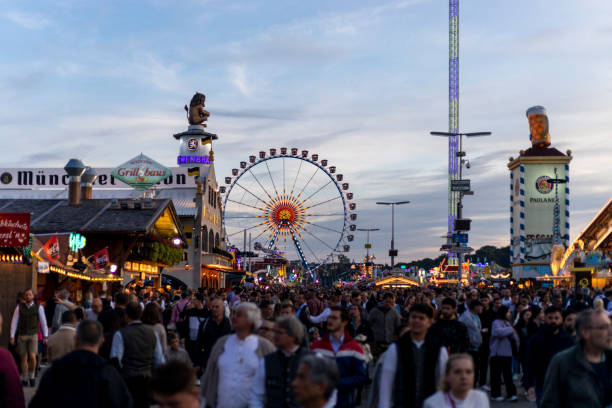 Theresienwiese, Munich, Bavaria, Germany, September 2022, Oktoberfest, Wiesn, view over the Oktoberfest with ferris wheel in the background and the tents of Paulaner and Loewenbraeu