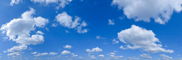 istock Panorama of a blue sky with white clouds 1427107863