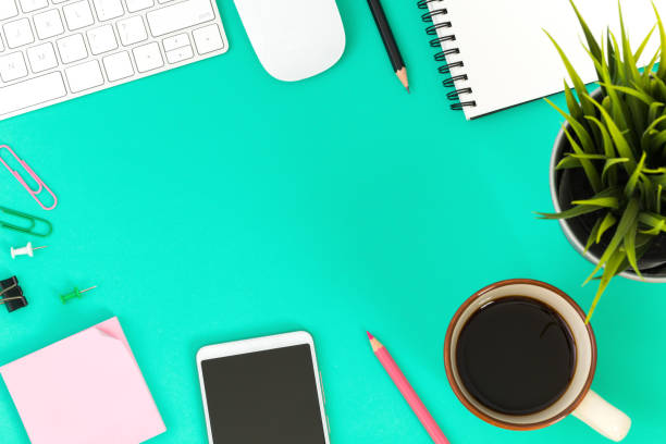 istock office desk with smartphone, computer and office supplies top view 1427116377