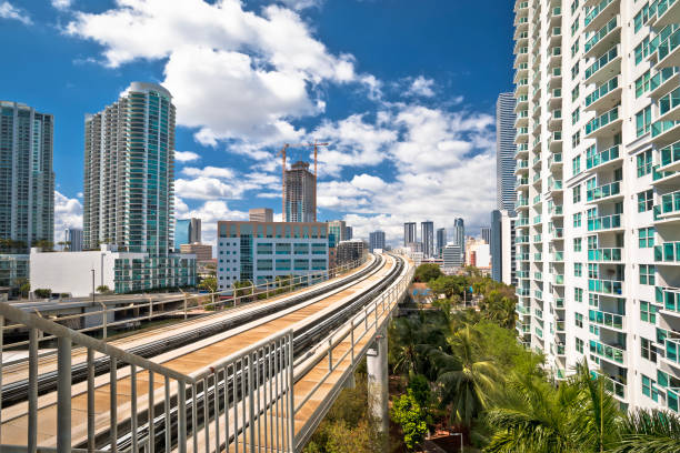 istock Miami downtown skyline and futuristic mover train view 1427121237