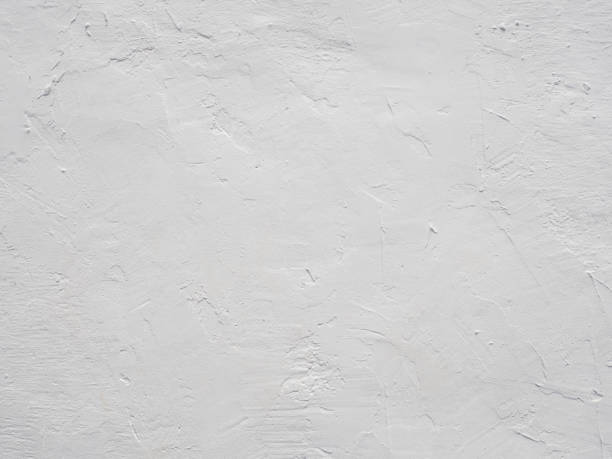 istock The white plastered wall. Gray concrete wall abstract background. 1427122865