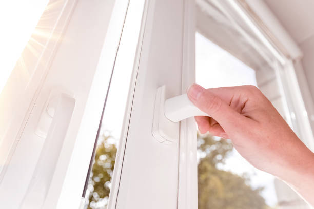 istock A hand opens a window to air the room. One sided open window. 1427128623