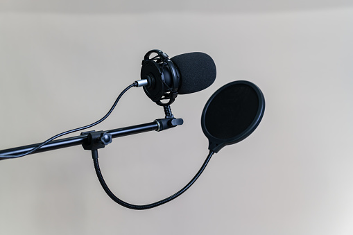 microphone in a recording studio. singer microphones on white background