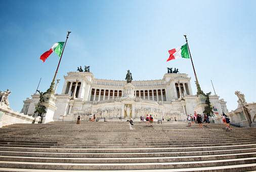 Rome, Italy - July 11 2018: Tourists on summer morning at the Altar of the Fatherland.