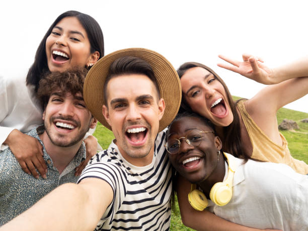 Happy diverse friendship concept with young people having fun together
