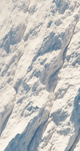 istock 3d rendering. Texture of white loose snow. Background for your winter design 1427137606