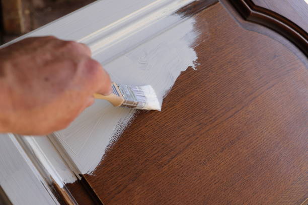 istock Paint a brown cabinet with white paint 1427139754