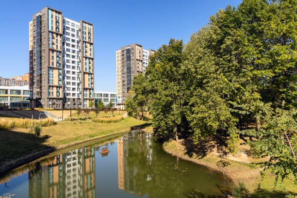 istock New modern residential district with the lake and trees 1427145500