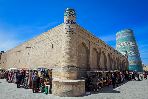 The Ark of Bukhara inside walls. The Ark Citadel is an ancient massive fortress located in Bukhara city, Uzbekistan. Blue sky with copy space for text