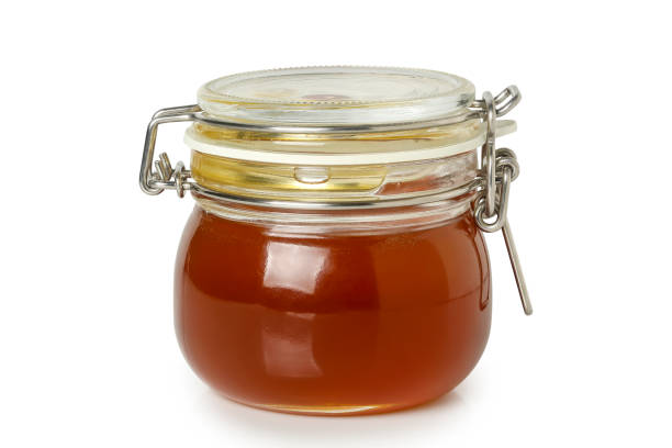 istock jar of honey isolated 1427146330