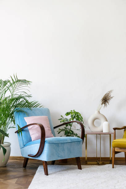 istock Blue comfortable armchair in apartment with vintage style interior 1427192587