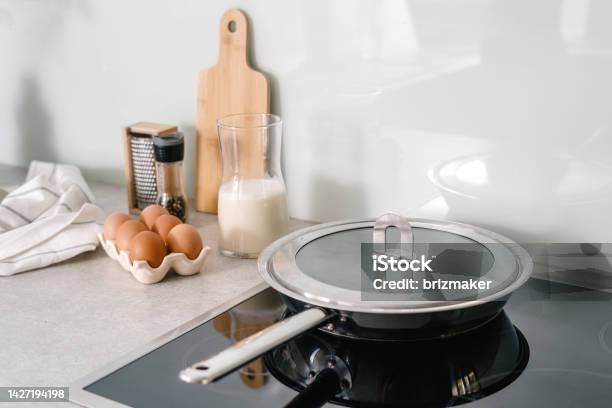 Frying Pan On Electric Stove At Modern Kitchen Stock Photo - Download Image Now - Cooking Pan, Glass-Ceramic Stove Top, Stove