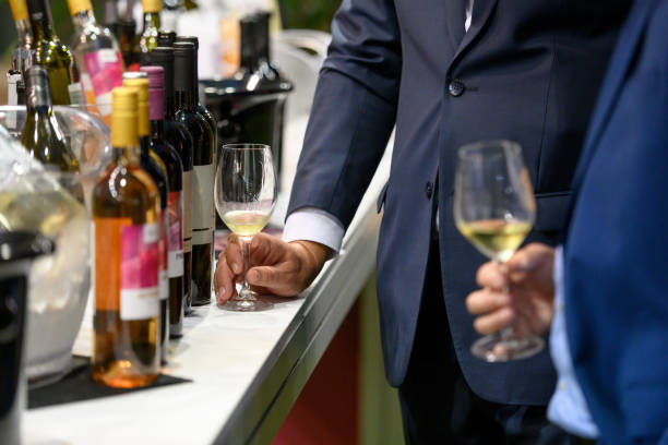 istock Businessmen tasting white wine 1427204223